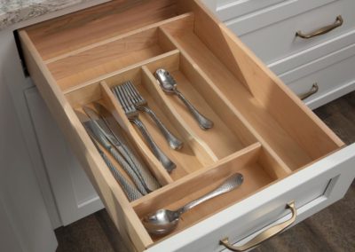 Cabinet drawer with utensils